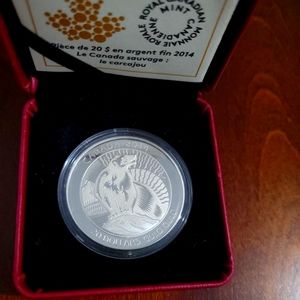 $20 fine silver coin. UNTAMED Canada wolverine.